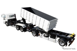 狭小現場での作業性を大幅に向上させた「脱着ボデー車」登場…コンテナ着脱作業スペースを60％削減…前吊り式フックロールフルトレーラ…極東開発工業 画像